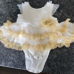 Like new!Newborn Baby Essential baby dress/onesie!